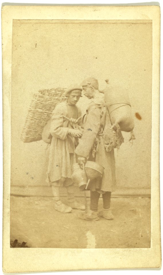 Full-length portrait of two men, standing, facing each other LCCN99615608