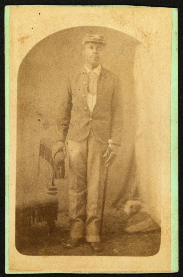 Full-length portrait of an African-American man, possibly a Buffalo soldier) - Mosser & Snell, Traveling Photographic Art Gallery, Cantonment, Ind. Terr LCCN2010647775