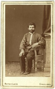 Full-length portrait of Armenian man, seated, facing front LCCN99615600