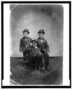 Full-length portrait of two boys wearing suits and hats LCCN2006689601
