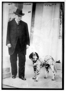 G. Cleveland, standing with dog LCCN2014680825
