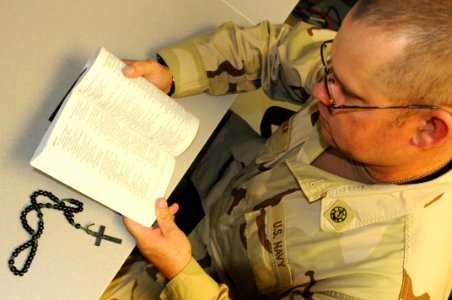 Guantanamo chaplain reads his bible DVIDS356447