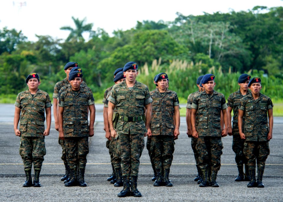 Guatemalan service members participate in a closing ceremony at the Guatemalan Marine Brigade base in Puerto Barrios, Guatemala, Aug. 22, 2014, as part of Southern Partnership Station (SPS) 2014 140822-N-XQ474-148