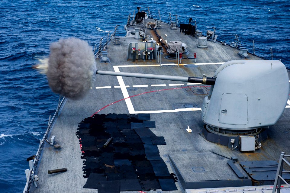 Guided-missile destroyer USS Gonzalez (DDG 66) conducts a live-fire exercise using a MK 45 5-inch gun