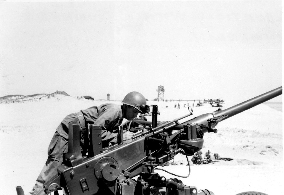 Gunner checking elevation