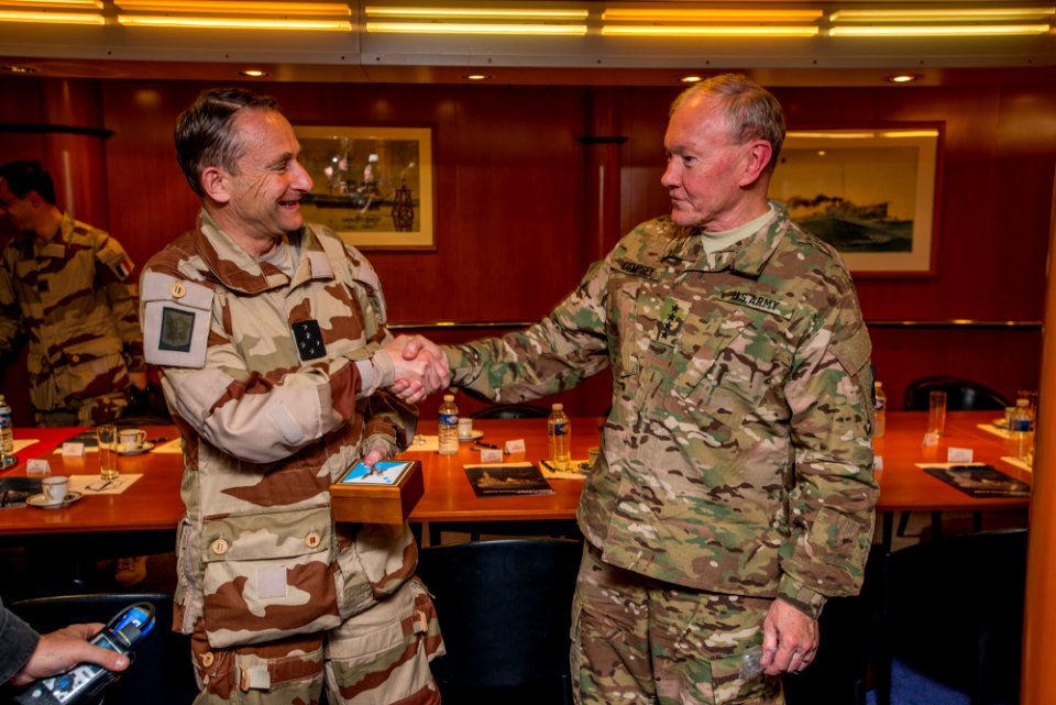 Hairman of the Joint Chiefs of Staff Gen. Martin Dempsey, right, shakes hands with French Chief of Defense Staff Gen. Pierre De Villiers. (16775546645)