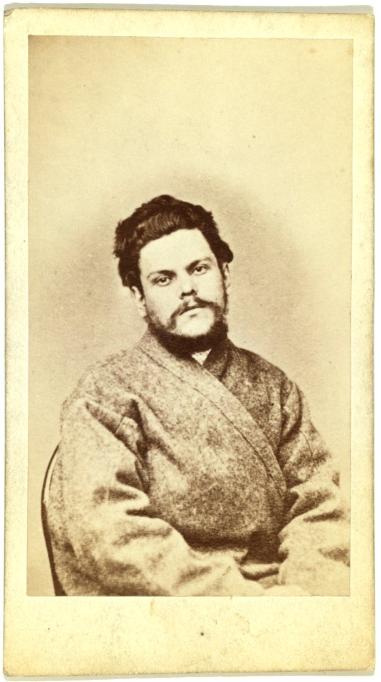 Half-length portrait of a man, dressed in convict clothing, facing front LCCN99615647