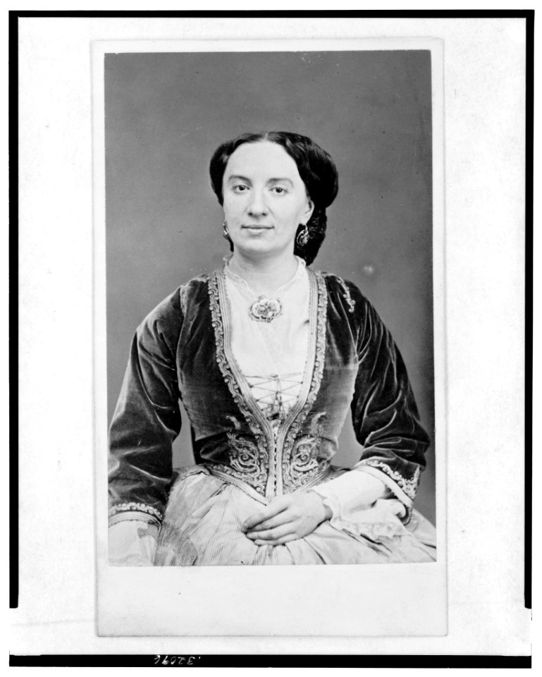 Half-length portrait of a woman, seated, facing front LCCN2005692475