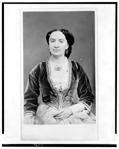 Half-length portrait of a woman, seated, facing front LCCN2005692475