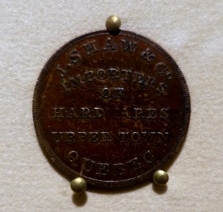 Half-penny token, J.Shaw & Co. Importers of Hardwares Upper Town Quebec - Bank of Montréal Museum - Bank of Montreal, Main Montreal Branch - 119, rue Saint-Jacques, Montreal, Quebec, Canada - DSC08430 photo