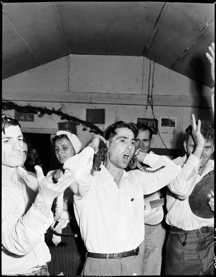 Handling serpents at the Pentecostal Church of God. This church is not on company property, nor have any company... - NARA - 541334