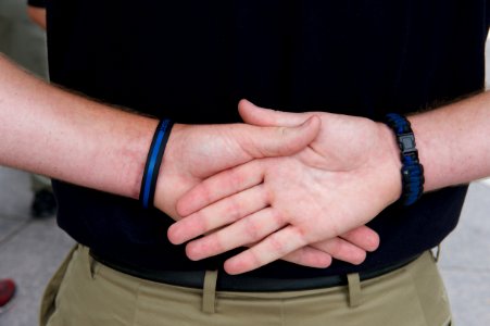 Hands behind back law enforcement explorer photo