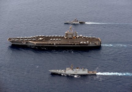 INS Kulish (P63), top, and INS Satpura (F48), bottom, and USS Carl Vinson (CVN 70) are underway in formation during Exercise Malabar 2012