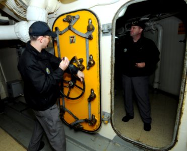 Inspectors review spaces of the retired battleship USS Wisconsin. (8428932733)