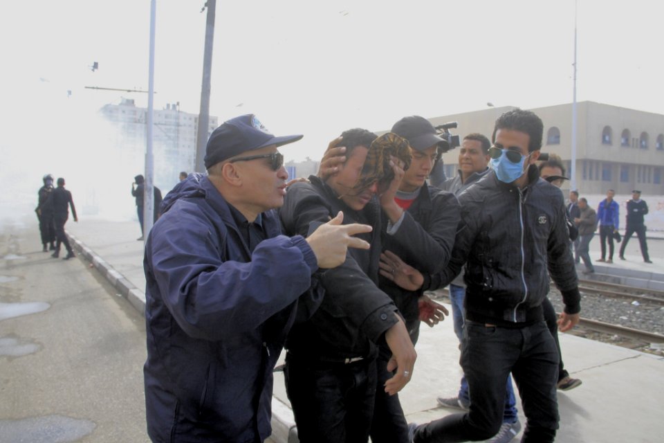 Injured man - protest at Al-Azhar University Cairo 11-Dec-2013