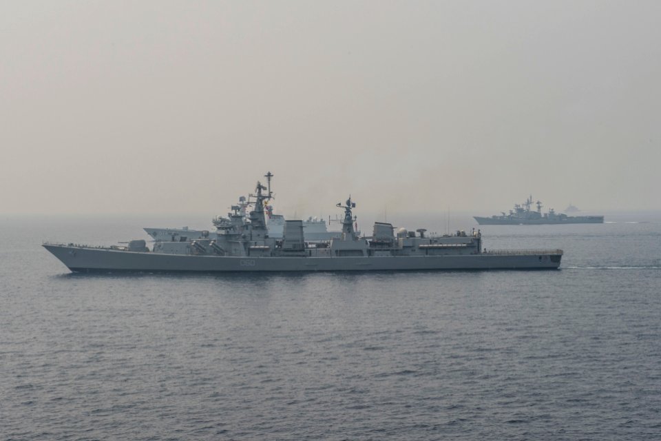 INS Mysore (D60), PLAN Sanya (D574), and INS Ranvijay steam alongside USS Antietam (CG 54) during an exercise