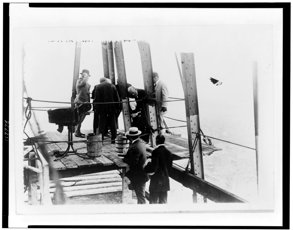 Insurance co. pres. John Rogers Hegeman driving last rivet, Metropolitan Life building tower LCCN97503286