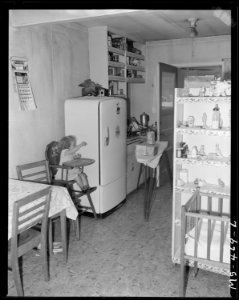Interior of home of Tony Buseito, miner, who lives in government project adjacent to King Mine. Hiawatha, Carbon... - NARA - 540432