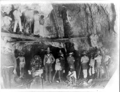 Interior of gold and silver mine in Mexico, showing various workers, tools, and operations LCCN2017646649 photo