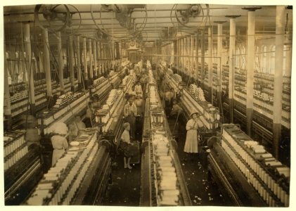 Interior of Magnolia (Miss) Cotton Mills spinning room. See the little ones scattered through the mill. All work. See also other Magnolia photos and labels. LOC cph.3b42902