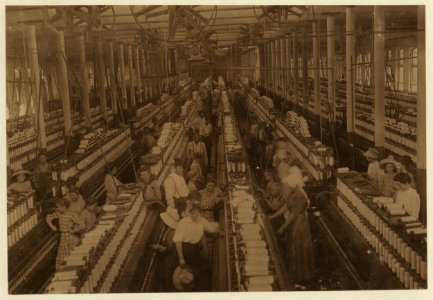 Interior of Magnolia (Miss.) Cotton Mills spinning room. See the little ones scattered through the mill. All work. See also other Magnolia photos and labels. LOC nclc.01875