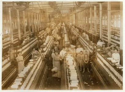 Interior of Magnolia (Miss.) Cotton Mills spinning room. See the little ones scattered through the mill. All work. See also other Magnolia photos and labels. LOC nclc.05456