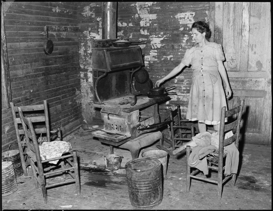 Interior of one of the houses which are rented to miners by an estate which acquired the property when the coal mines... - NARA - 541184
