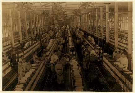 Interior of Magnolia (Miss.) Cotton Mills spinning room. See the little ones scattered through the mill. All work. See also other Magnolia photos and labels. LOC nclc.01876