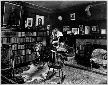 Interior of Sagamore Hill with bookcases and fireplace LCCN92520601