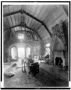 Interior of the stone mountain lodge of Mrs. Paul T. Mayo, Bear Creek Cañon, Rocky Mountains, Colorado, designed by architect Jacques Benois Benedict, showing cathedral ceiling, fireplace, LCCN97510549