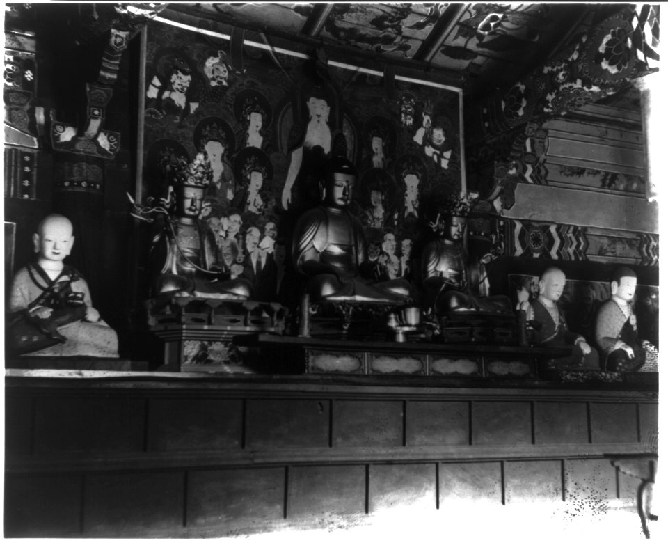 Interior view of Korean Buddhist temple showing several statues and paintings LCCN2008676777