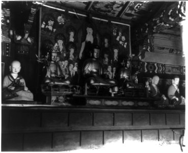 Interior view of Korean Buddhist temple showing several statues and paintings LCCN2008676777