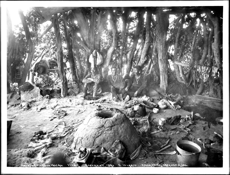 Interior of a Navajo chief's hogan with Navajo chiefs inside, ca.1892 (CHS-4730)