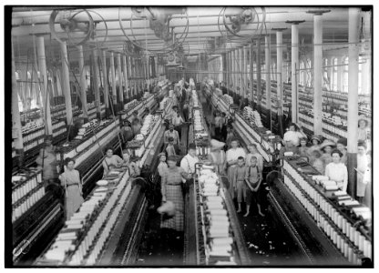Interior of Magnolia (Miss.) Cotton Mills spinning room. See the little ones scattered through the mill. All work. See also other Magnolia photos and labels. LOC nclc.05456