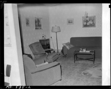 Interior of home of miner living in house owned by Mrs. Rain. Company collect rent for them. Hi Heat Coal Company... - NARA - 540476 photo