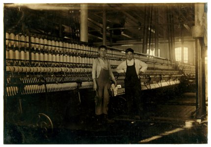 Interior Wamsutta Mill, Wilfred Pepin, 42 Bowditch St. (youngest boy, appears 13 yrs. old). Has been working a few weeks in Mule Room -4. LOC nclc.02458