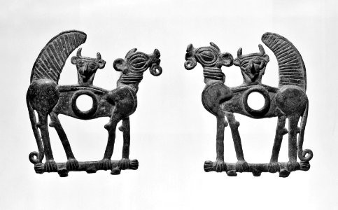 Iranian - Pair of Cheekpieces in the Shape of Monsters - Walters 54116, 54117