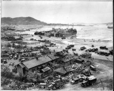 Invasion of Inchon, Korea. Four LST's unload men and equipment on beach. Three of the LST's shown are LST-611... - NARA - 520772