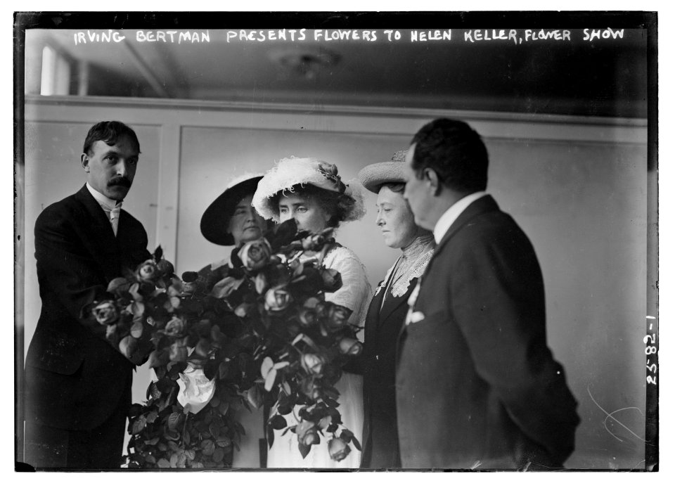 Irving Bertman presents flowers to Helen Keller, Flower Show LCCN2014691658