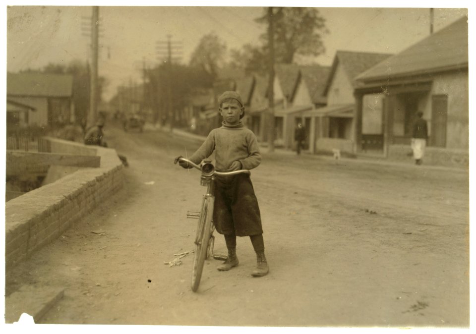 Isaac Boyett, 'I'm de whole show.' The twelve year old proprietor, manager and messenger of the Club Messenger Service, 402 Austin Street, Waco. The photo shows him in the heart of the Red LOC cph.3a31143