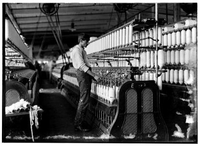 It seems a pity that some of the spinning frames are so large that the children cannot operate them. Catawba Cotton Mills. LOC nclc.05388 photo
