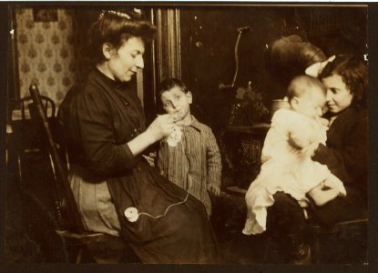 Italian family living 428 E. 116th St., 2 floor back. They were so illiterate I couldn't get their names. Have been in U.S. only one month. Mother is learning to make lace for factory near LOC nclc.04116