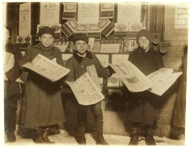 Italian newsies selling on Main St. at 10 P.M. Left to right- Lawrence Ferrer, 12 years old, 76 Front Ave.; Mathew Chinera, 11 years old, 58 E. Prier St.; Steve Cajuto, 11 years old, 218 7 LOC nclc.03402