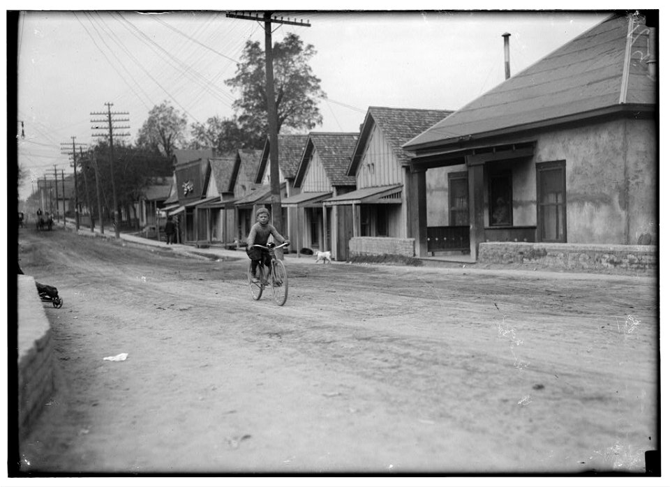 Isaac Boyett, 'I'm de whole show.' The twelve year old proprietor, manager and messenger of the Club Messenger Service, 402 Austin Street, Waco Tex. The photo shows him in the heart of the LOC nclc.05542