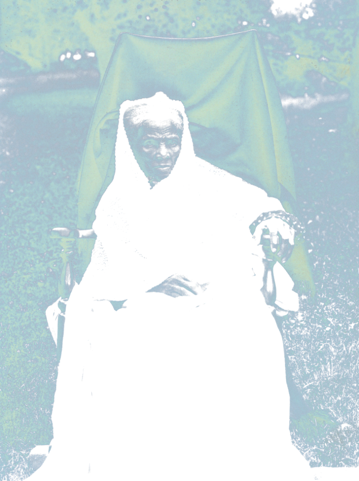 Harriet Tubman, full-length portrait, seated in chair, facing front, probably at her home in Auburn, New York LCCN2002716779