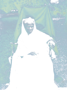 Harriet Tubman, full-length portrait, seated in chair, facing front, probably at her home in Auburn, New York LCCN2002716779