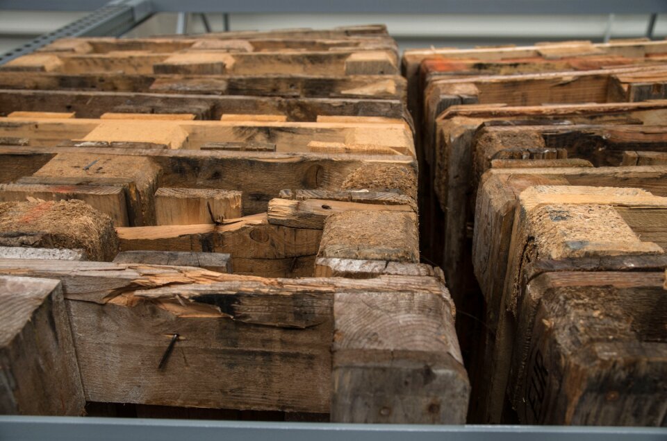 Wooden pallets logistics stacked up