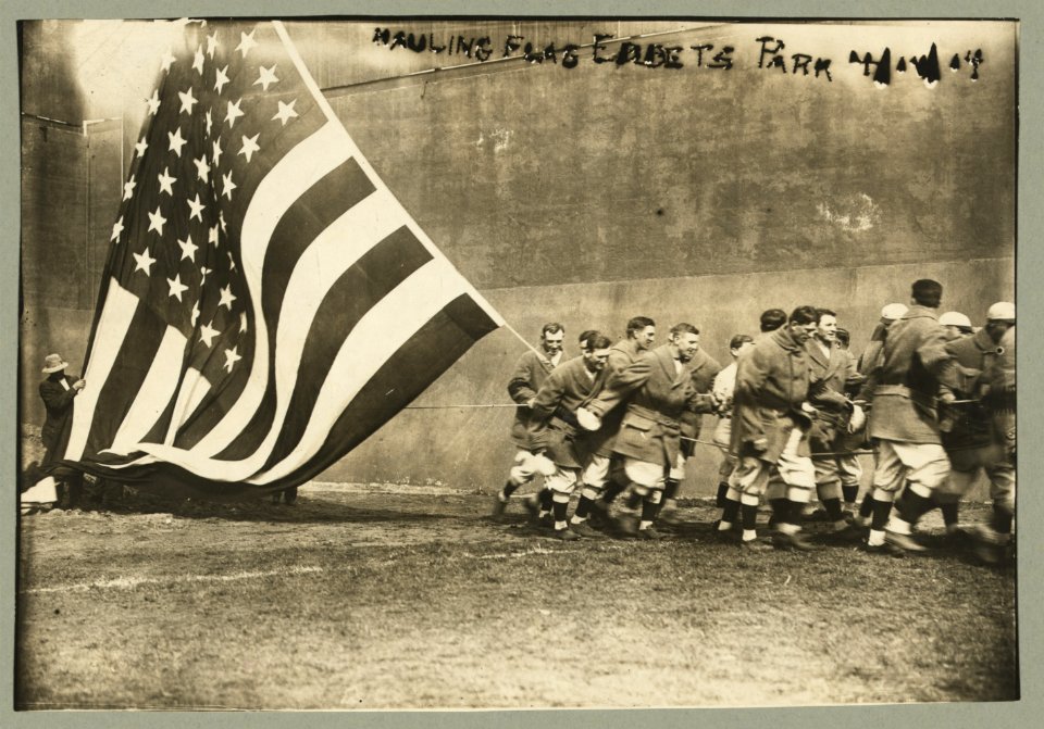 Hauling flag-Ebbets Park LCCN93516456