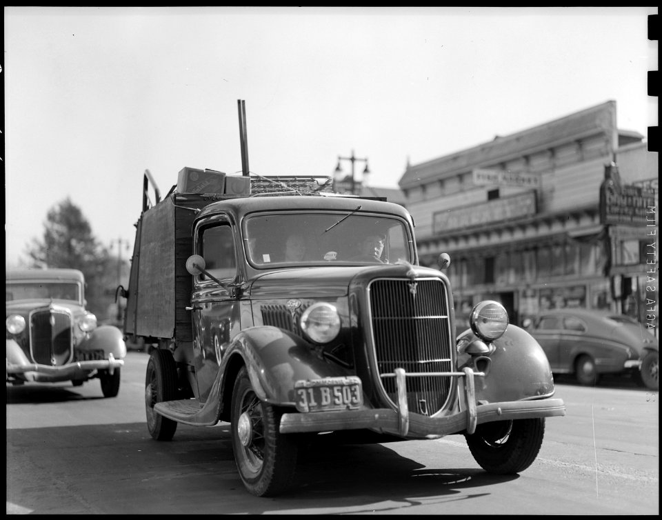 Hayward, California. Families of Japanese ancestry in their new truck, piled high with household an . . . - NARA - 537763