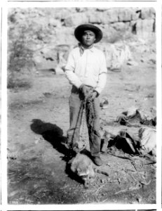 Havasupai Indian boy with a captured raccoon, ca.1899 (CHS-3773)